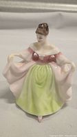 Front view of the Royal Doulton Sara figurine showing detailed dress and pose.