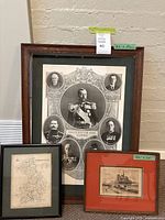 Photo showing all three framed pieces with dimensions, including large 'Trustees of the Empire' print, Cambridgeshire map, and etching.