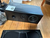Polk center channel speaker without grille showing drivers