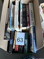 Overall view of box showing mix of books and lot number