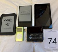 Group shot showing all five electronic devices