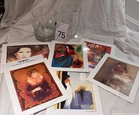 Group shot showing seven Serio lithographs, glass ice bucket, crystal vase, and certificate cards