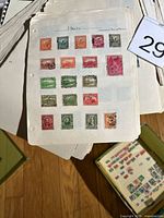 Album page labelled Haiti displaying 21 Haitian postage stamps in various colours and denominations