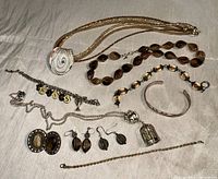 Lot overview showing all seven jewelry pieces laid out
