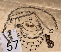 Group view of all jewelry pieces on fabric background