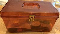 Closed amber sewing box front view