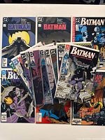 Stack of bagged Batman comics showing variety of key issue covers