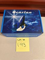 Closed retail box showing product image and name