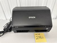 Front view of Epson ES-400 scanner closed with power adapter cable visible