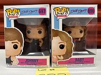 Front view of both boxed figures showing characters and numbers