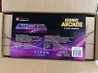 Boxed Iconic Arcade console label showing product image and specifications