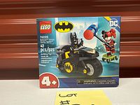 Front of sealed LEGO 76220 box showing Batman and Harley Quinn