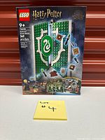 Front of sealed LEGO 76410 box
