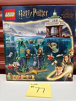 Front of LEGO box showing set 76420 details