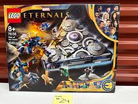 Front of sealed LEGO 76156 box showing artwork, minifigure lineup and age/piece count
