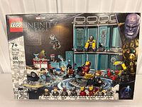 Front of sealed LEGO Marvel set 76216 box showing contents and piece count