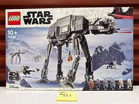 Front of sealed LEGO Star Wars AT-AT set 75288 showing model and minifig lineup