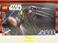 Front of sealed LEGO Star Wars 75336 box showing starship image and minifigures lineup