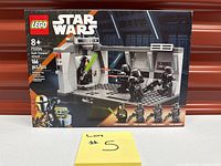 Front of sealed LEGO Star Wars 75324 box showing contents and minifigures