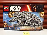 Front of sealed LEGO Star Wars Millennium Falcon box showing set details
