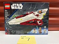 Front of sealed LEGO Star Wars 75333 box with spacecraft image and minifigure icons