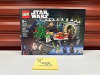 Front of sealed LEGO Star Wars 40658 box showing set art and minifigure lineup