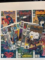 Spread of multiple The Punisher War Journal comics showing variety of covers