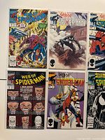 Nine bagged Web of Spider-Man comic books grouped for overview