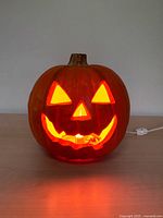 Front view showing illuminated jack-o'-lantern