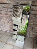 Front view of rectangular geometric segmented mirror