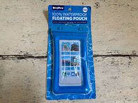 Front view of sealed DryPro waterproof floating phone pouch package