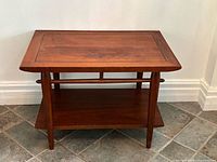 Front view of Lane walnut side table showing overall form