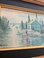 full view of framed print showing scene, signature, frame