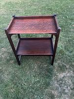 Front view of the two-tier table showing top and lower shelf