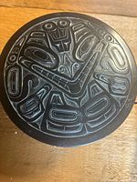 Top view showing full Haida-style carving on lid