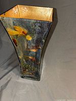 Full view of vase showing painted exterior and gold interior