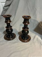 Pair of tenmoku glazed Dansk candlesticks front view