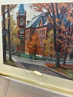 Front view of framed lithograph showing artwork, mat, frame