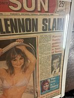 Full framed newspaper front page with headline visible