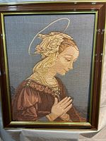 Full view of framed tapestry