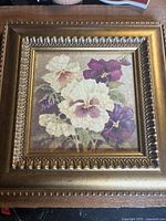 Front view of framed floral print