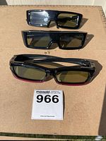 Three pairs of 3D glasses stacked front view