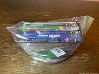 Side view of bag showing stacked DVD cases