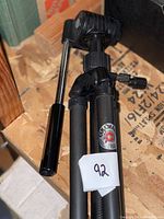 Folded Cullmann 2103 tripod showing logo and handle
