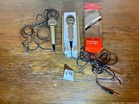 Overall view of both JVC MD-265 microphones, cables, and box