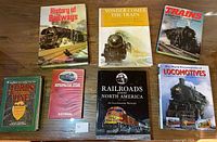 Group shot of all railroad books laid out on table