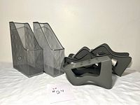 Lot overview showing two magazine holders and four shoe stackers