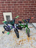 Both bikes side by side showing overall appearance and training wheels