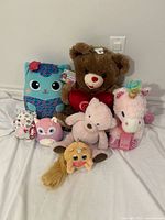 Group shot of all eight plush toys