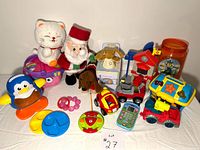 Group shot of all toys including plushes, vehicles, interactive toys and accessories